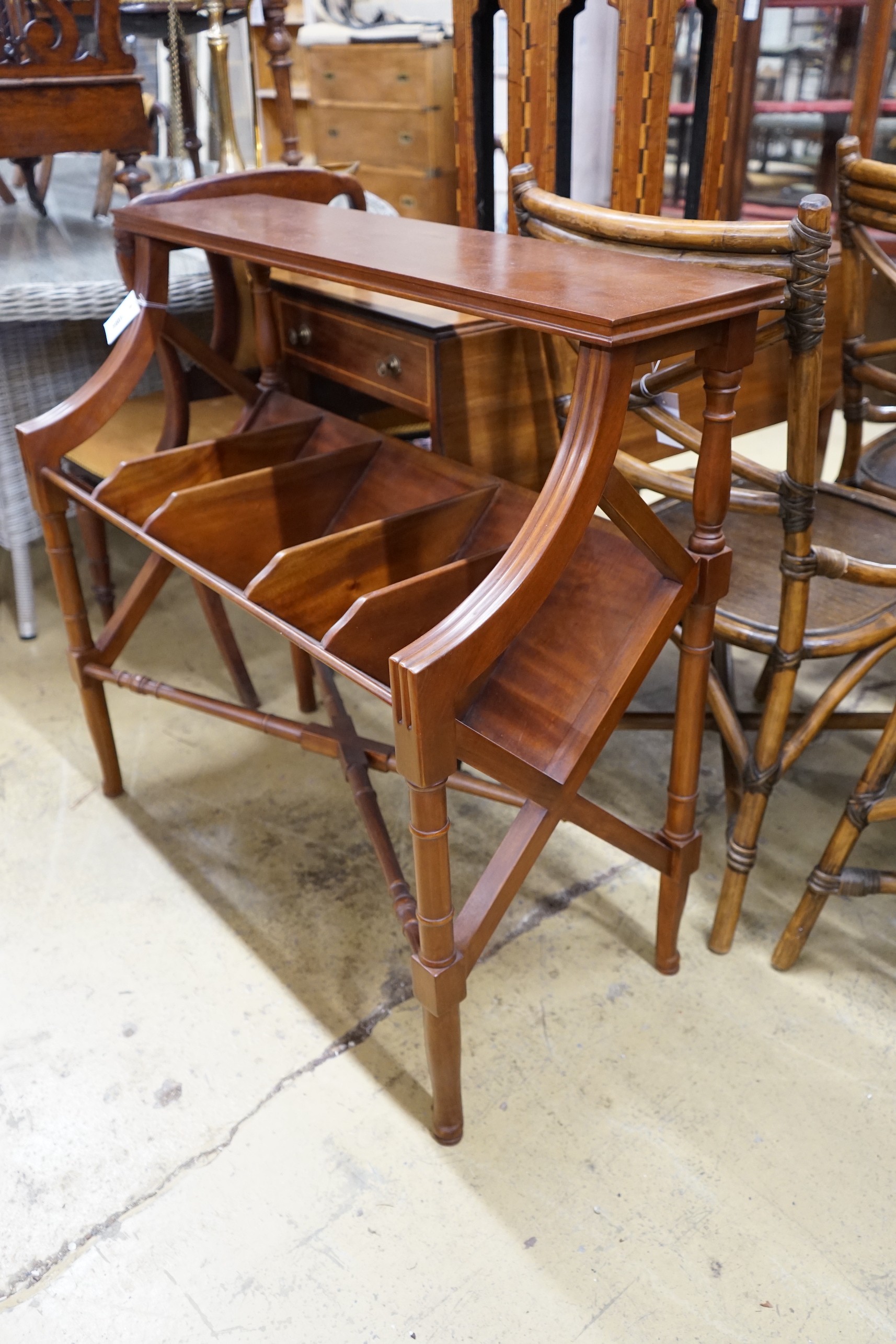 A reproduction mahogany five division book table, width 90cm, depth 40cm, height 84cm